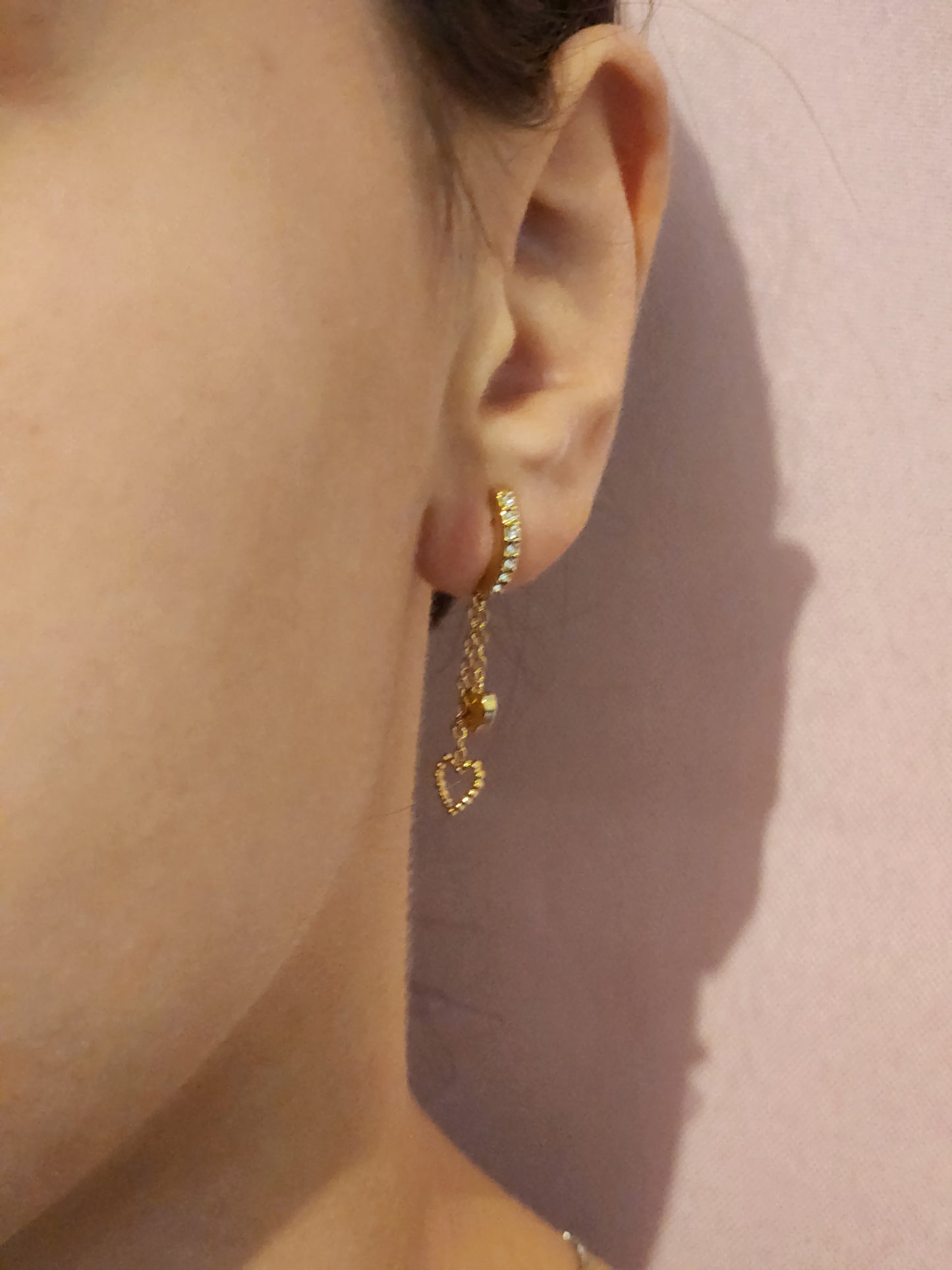 Boucles d'Oreilles Olivia en acier inoxydable doré ou argenté avec design romantique et moderne.